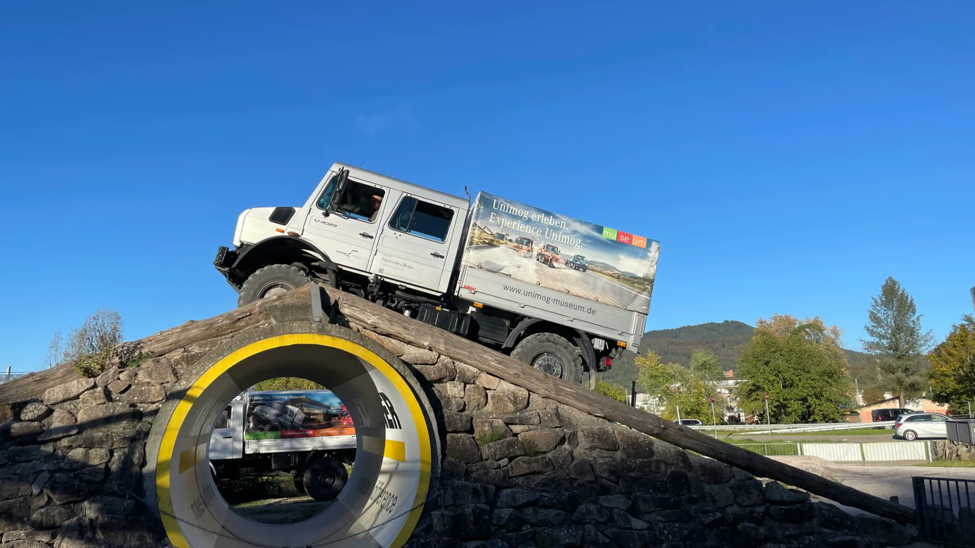 silver-mercedes-benz-unimog-climbing-45